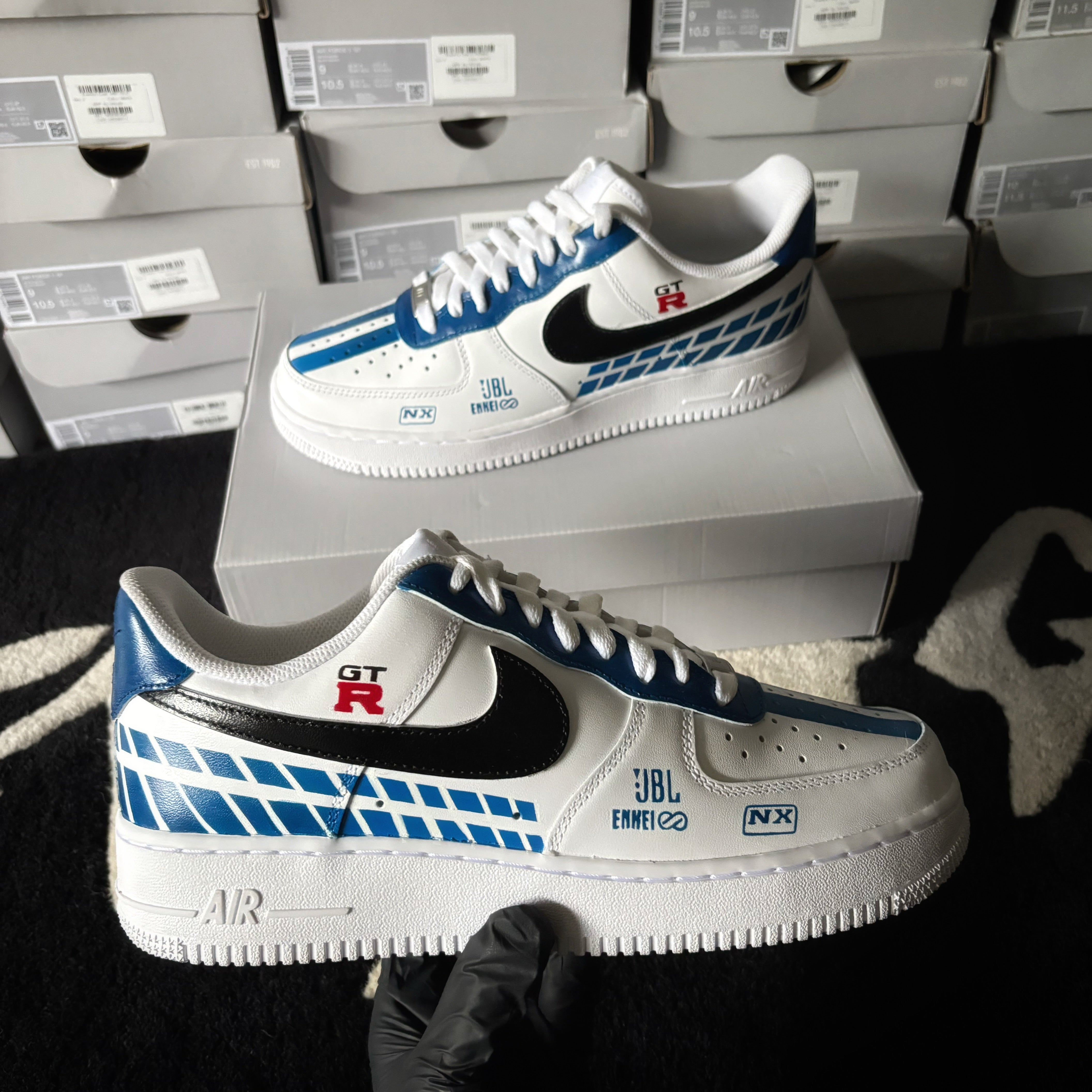 Brian O’Conner Nissan GT-R R34 Skyline x Nike Air Force 1 custom sneakers with blue and white racing-inspired artwork.