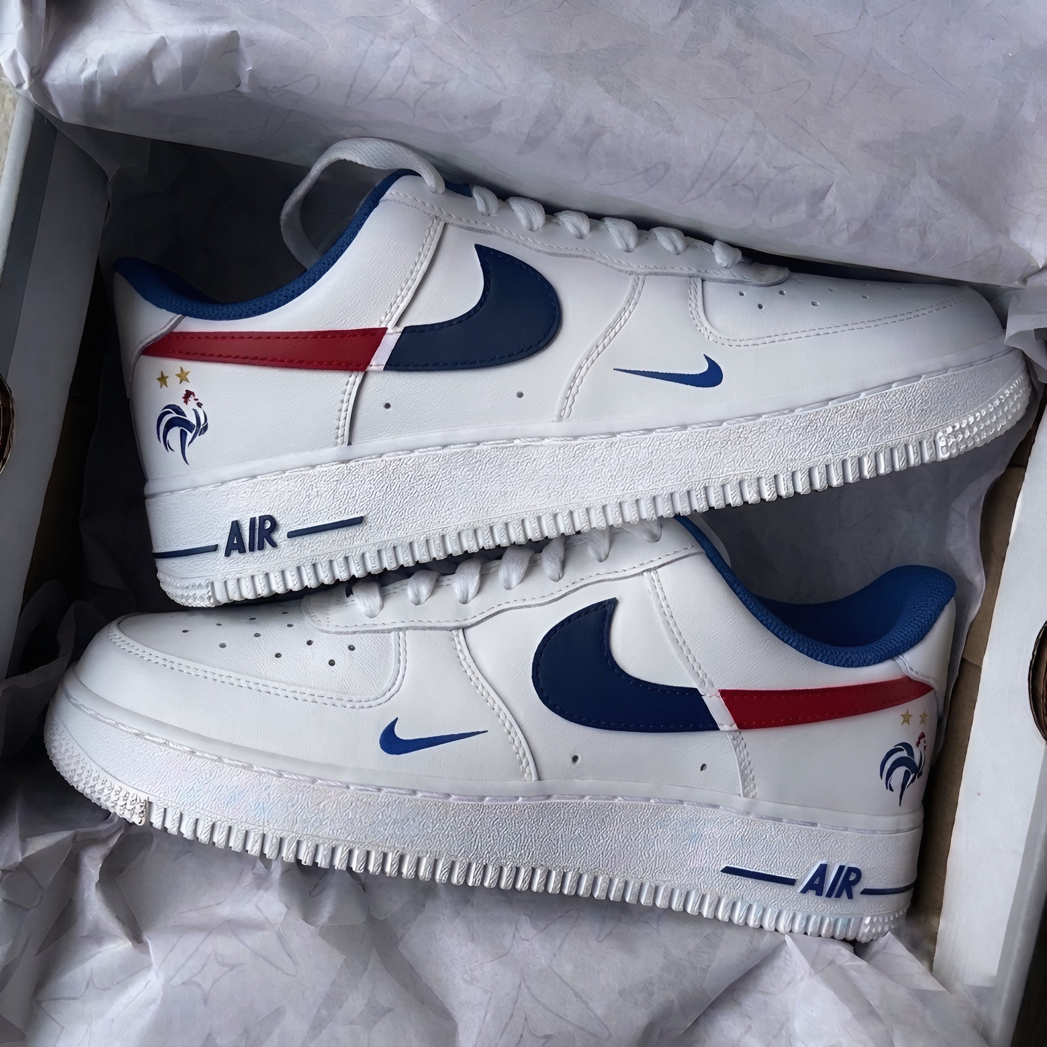 France F.C. x Nike Air Force 1 custom sneakers featuring Les Bleus inspired blue, white and red colours with the French rooster emblem.