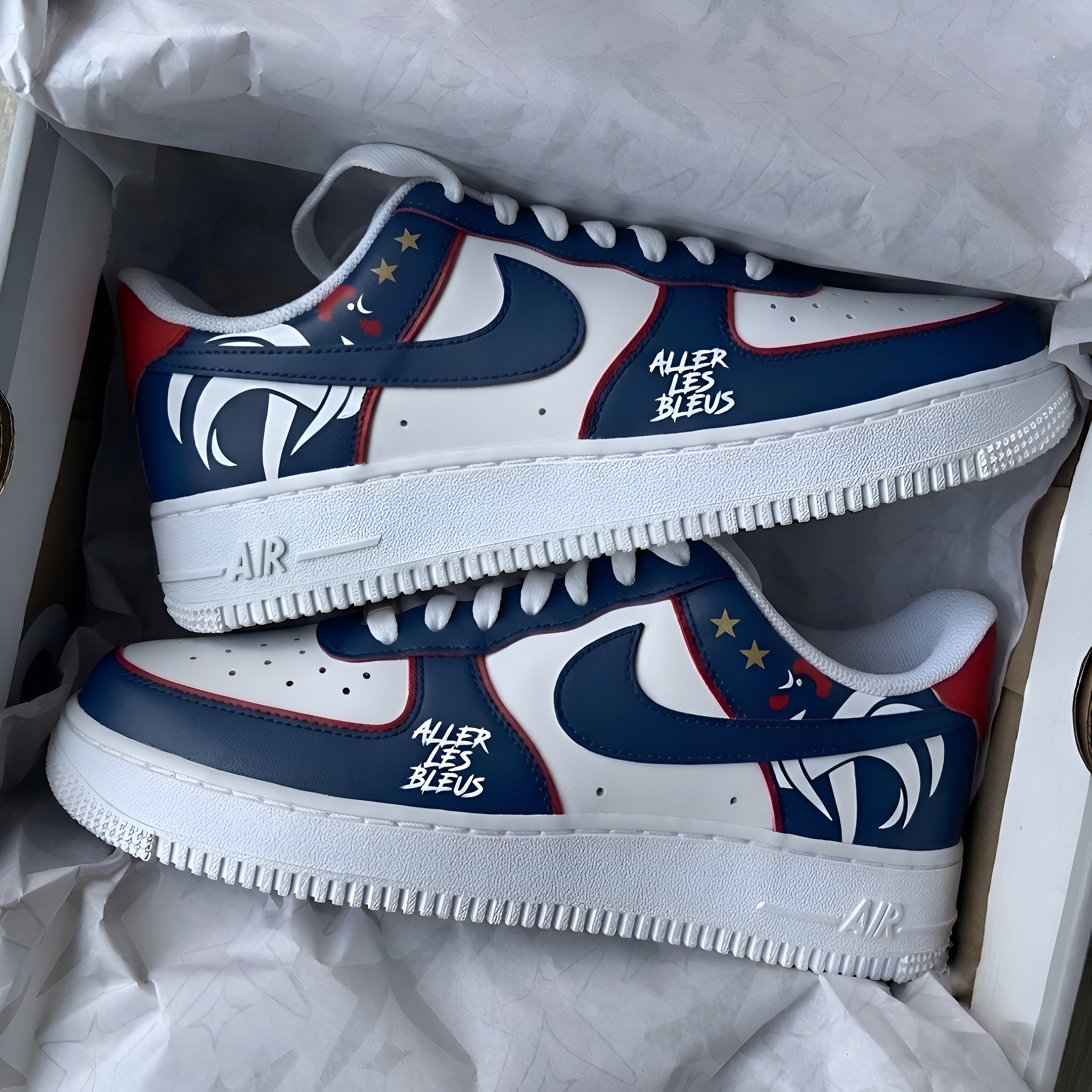 France F.C. x Nike Air Force 1 custom sneakers featuring Les Bleus inspired blue, white and red colours with the French rooster emblem.